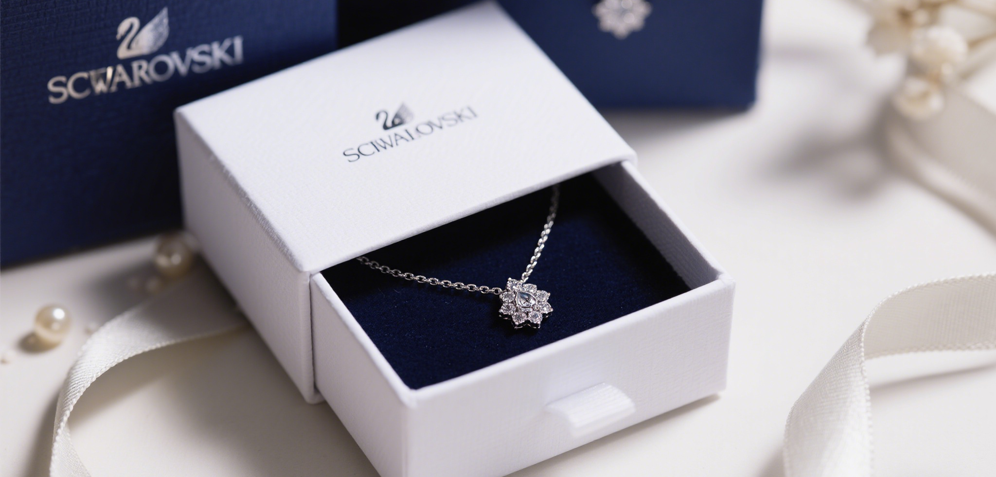 Swarovski necklace gift.png